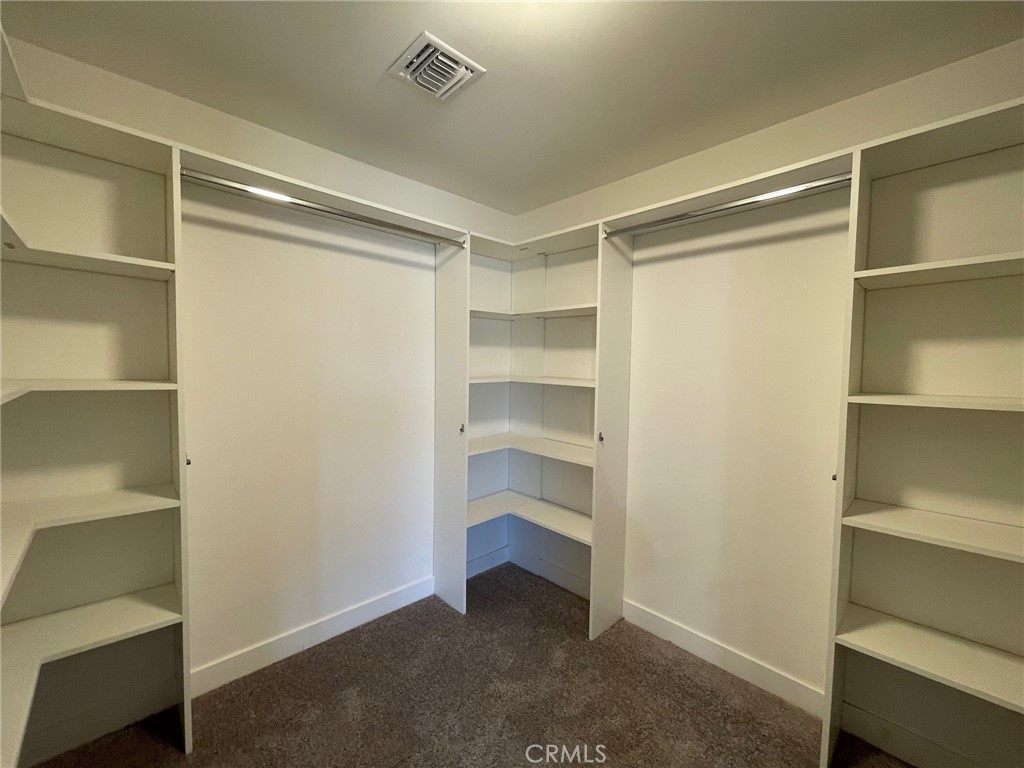 10055 East Ave R 10 Littlerock, CA 93543 - Photo 18 of 31 a view of an empty walk in closet