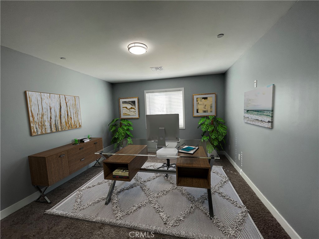 10055 East Ave R 10 Littlerock, CA 93543 - Photo 20 of 31 a living room with furniture and a potted plant