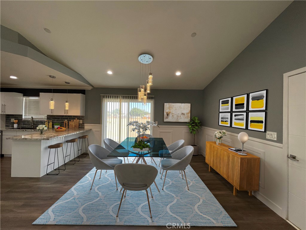 10055 East Ave R 10 Littlerock, CA 93543 - Photo 2 of 31 a kitchen with stainless steel appliances kitchen island granite countertop a sink and cabinets