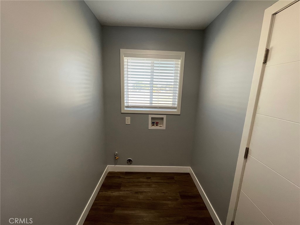 10055 East Ave R 10 Littlerock, CA 93543 - Photo 10 of 31 a view of a room with wooden floor and a window