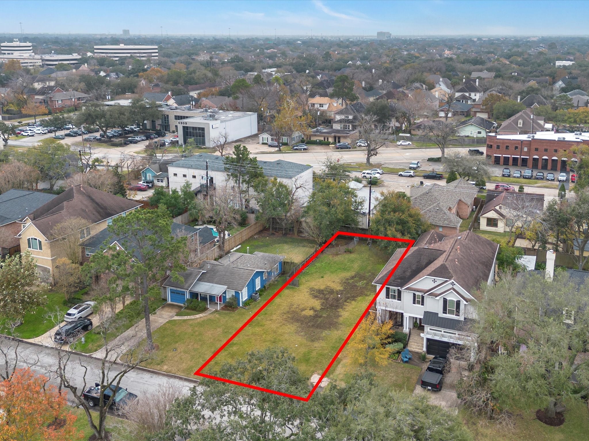 4921 Chestnut Street Bellaire, TX 77401 - Photo 5 of 9 an aerial view of a tennis ground and a houses