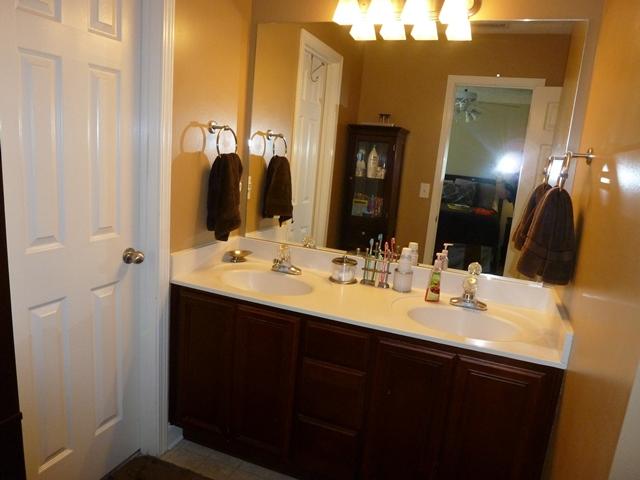 1894 Portway Road Spring Hill, TN 37174 - Photo 11 of 20 Master bath has double vanities, walk in closet and garden tub with shower.