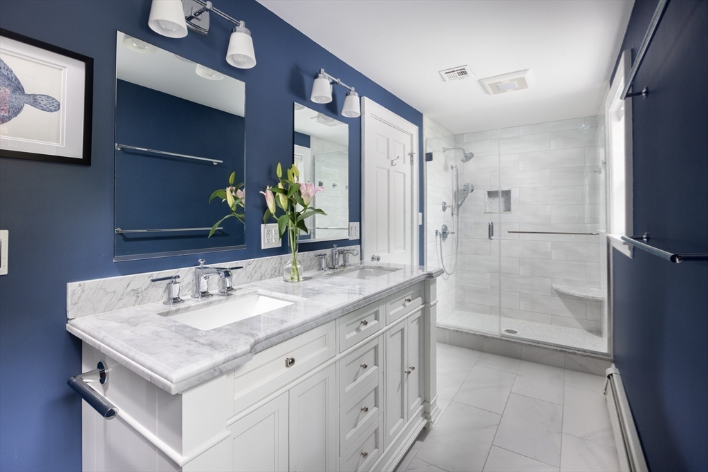 7 Southwick Circle Wellesley, MA 02481 - Photo 12 of 17 a bathroom with a sink and a mirror