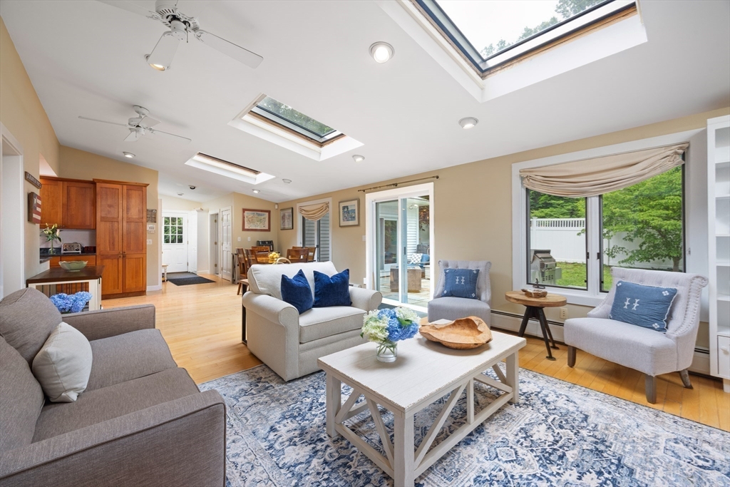 7 Southwick Circle Wellesley, MA 02481 - Photo 6 of 17 a living room with furniture and a large window