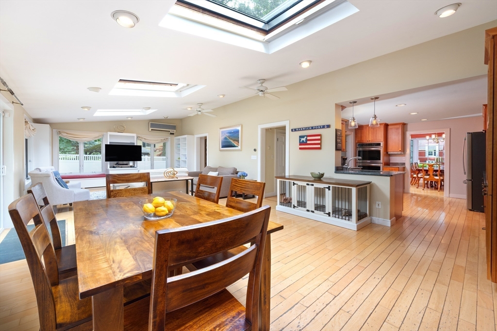 7 Southwick Circle Wellesley, MA 02481 - Photo 7 of 17 a living room with stainless steel appliances furniture and a flat screen tv