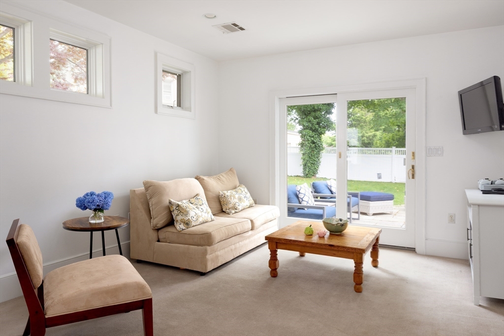 7 Southwick Circle Wellesley, MA 02481 - Photo 10 of 17 a living room with furniture and a window