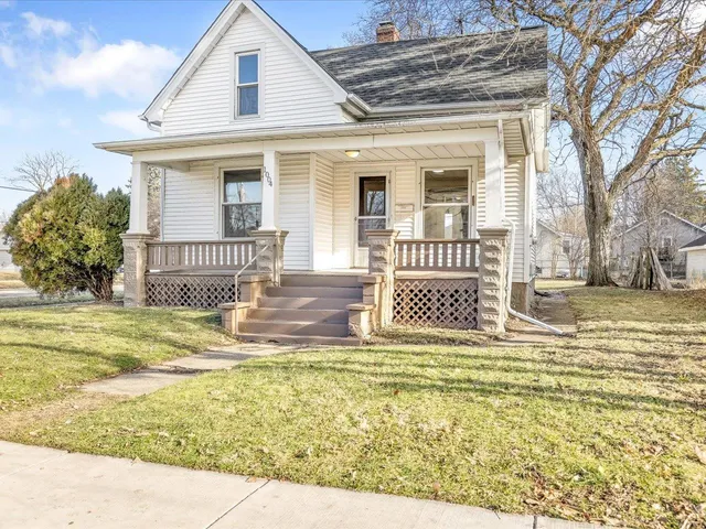 a view of a house with a swimming pool