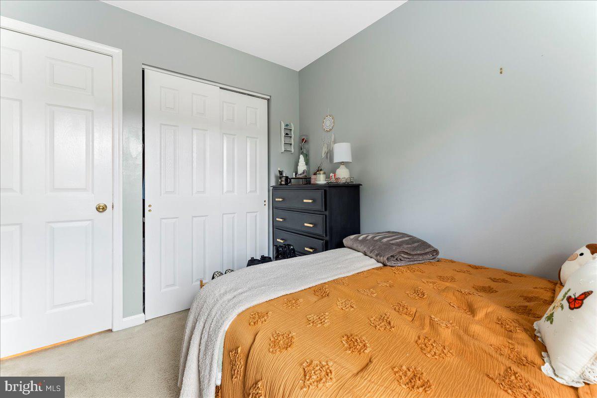 6 Marc Drive Coatesville, PA 19320 - Photo 14 of 25 a bedroom with a bed and a closet