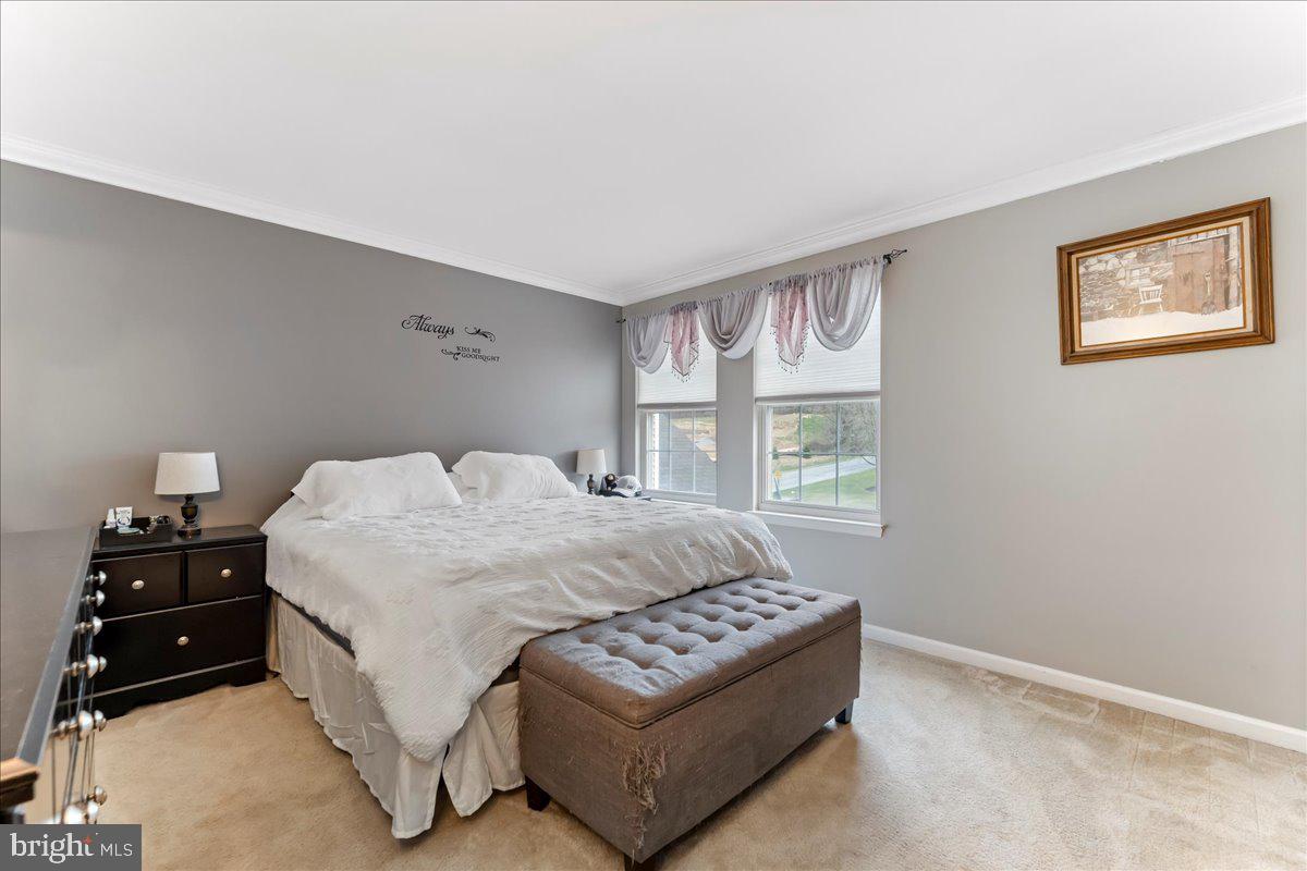 6 Marc Drive Coatesville, PA 19320 - Photo 18 of 25 a bedroom with a bed and a window