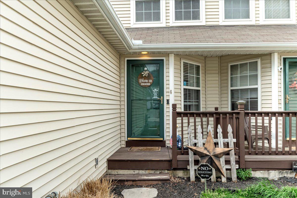 6 Marc Drive Coatesville, PA 19320 - Photo 2 of 25 a front view of a house with a porch