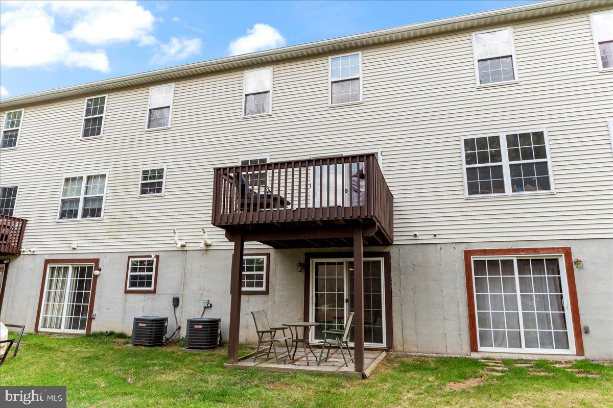 6 Marc Drive Coatesville, PA 19320 - Photo 24 of 25 a view of a house with a yard and a large window