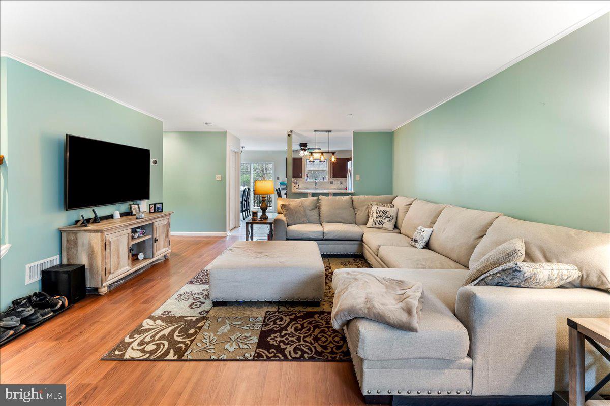 6 Marc Drive Coatesville, PA 19320 - Photo 3 of 25 a living room with furniture and a flat screen tv