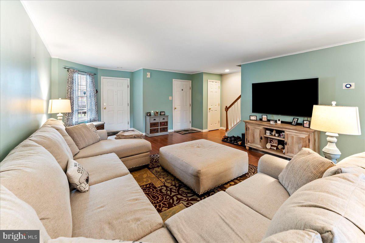 6 Marc Drive Coatesville, PA 19320 - Photo 4 of 25 a living room with furniture and a flat screen tv