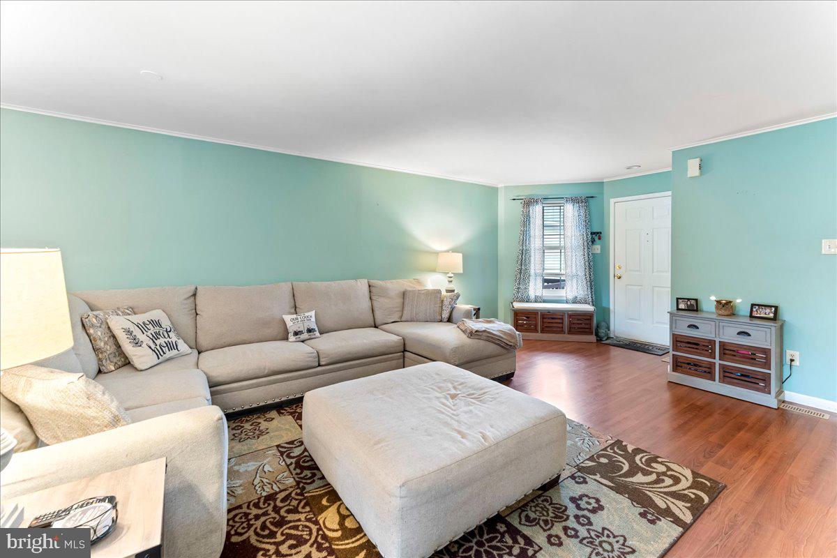 6 Marc Drive Coatesville, PA 19320 - Photo 5 of 25 a living room with furniture and a wooden floor