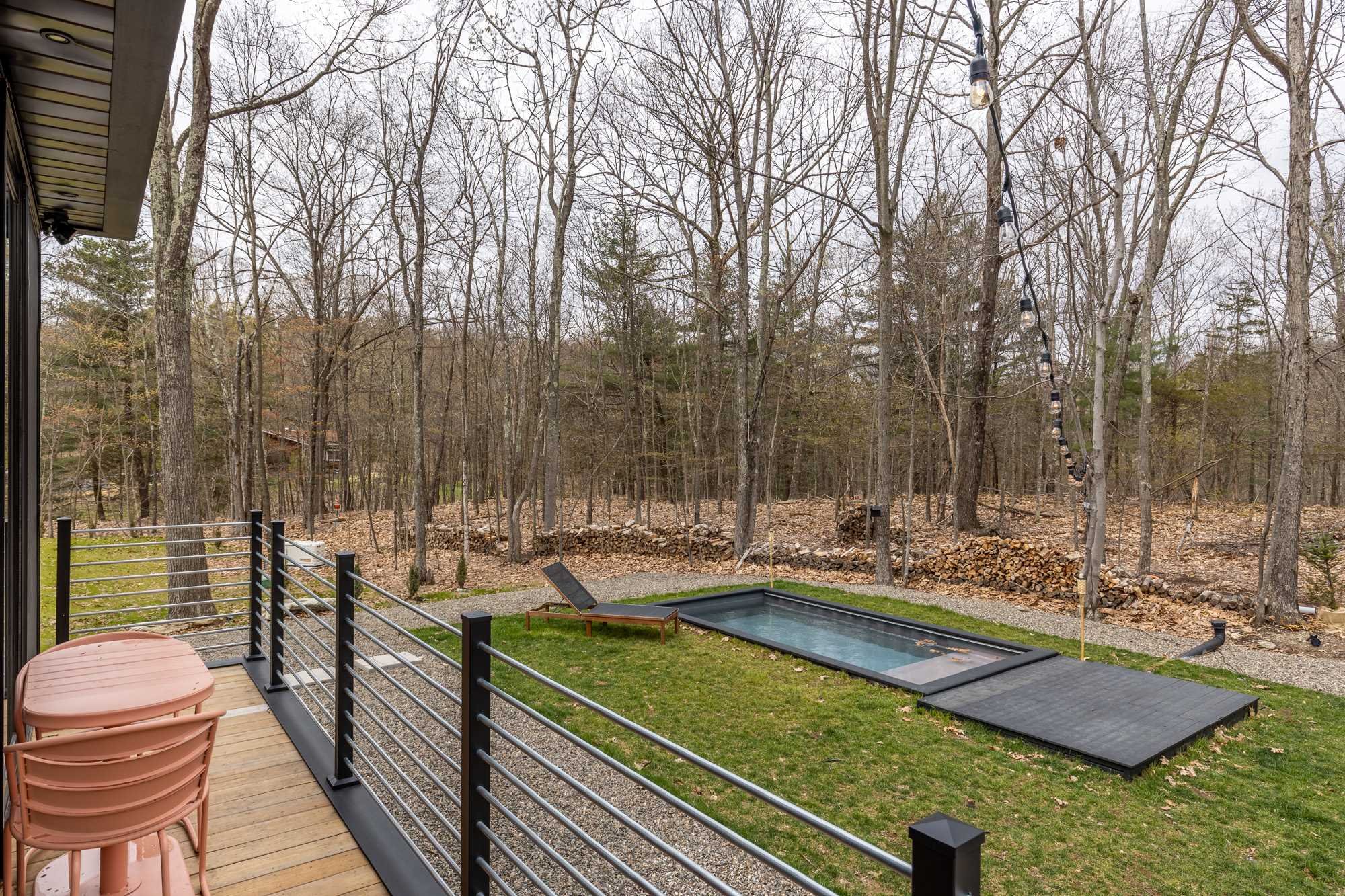 283 Willow Glen Road Milan, NY 12571 - Photo 22 of 23 a view of a house with pool and chairs