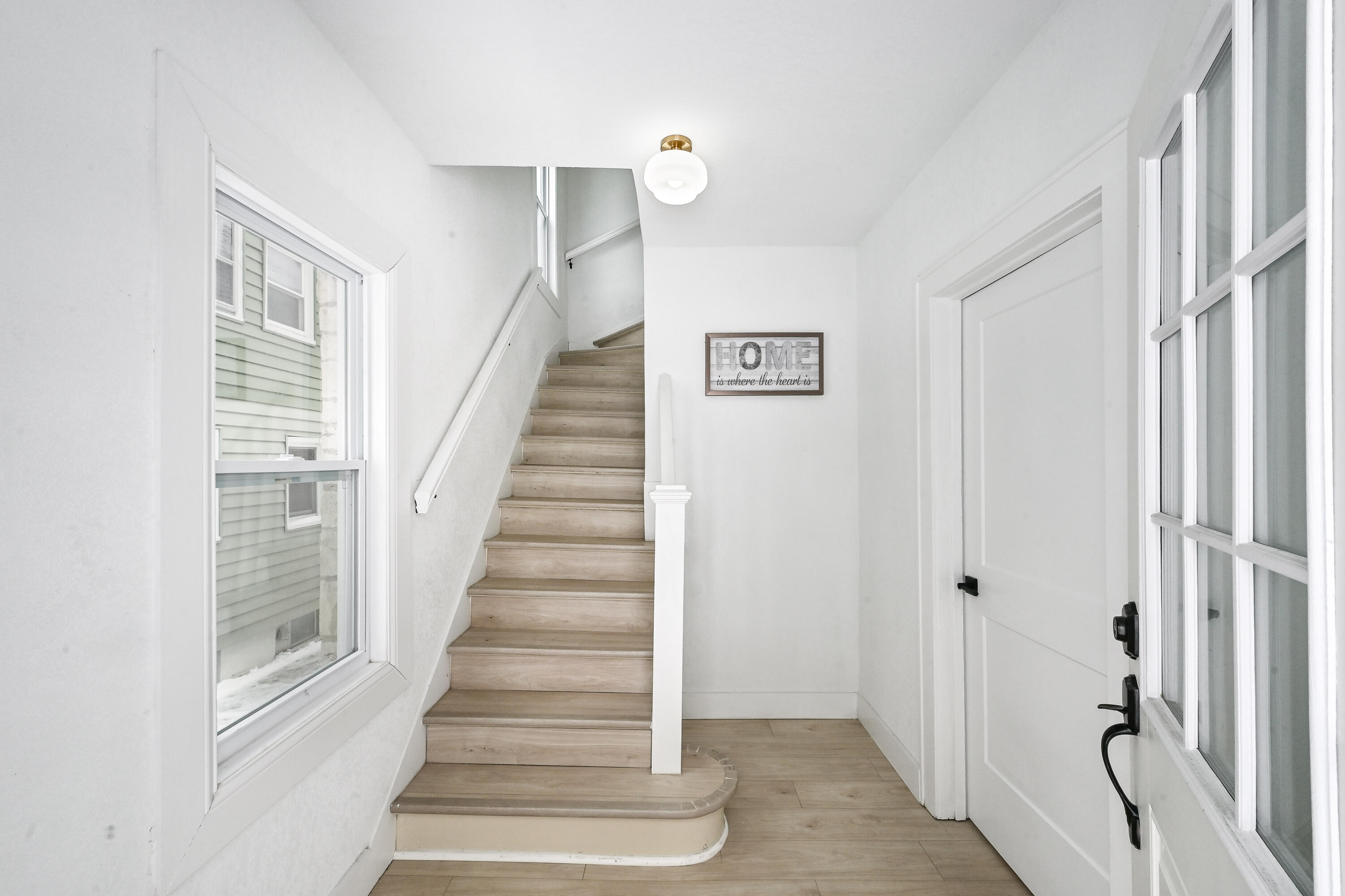 4640 West Scranton Place, Unit 4642 Milwaukee, WI 53216 - Photo 19 of 42 Staircase to Upper Unit