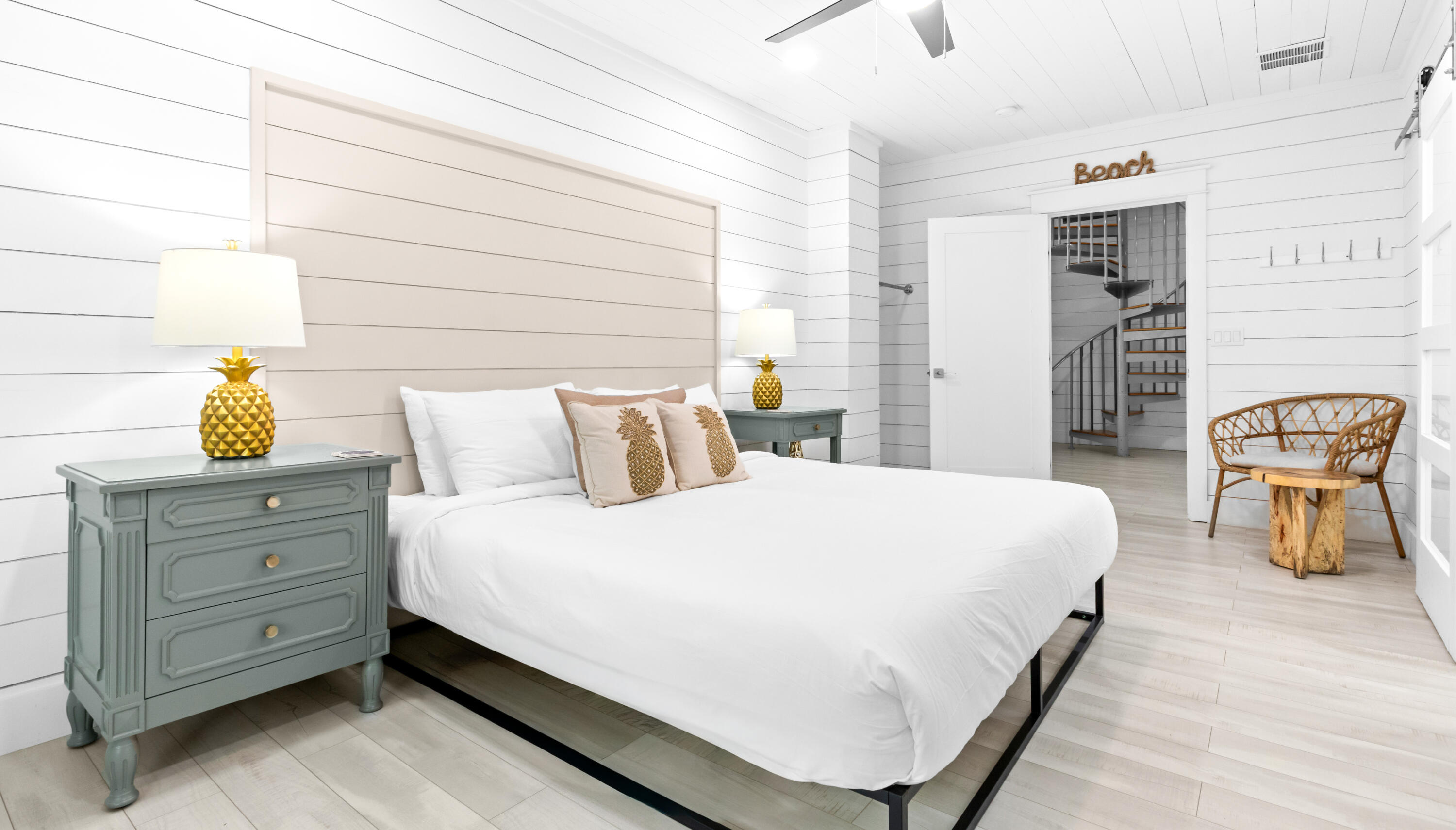 50 Maple Street Santa Rosa Beach, FL 32459 - Photo 20 of 60 a bedroom with a bed and a table