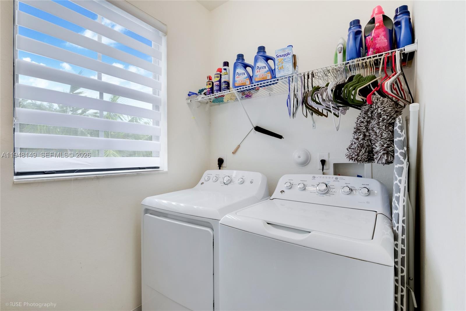 11711 Southwest 254th Street Homestead, FL 33032 - Photo 14 of 17 a utility room with dryer and washer