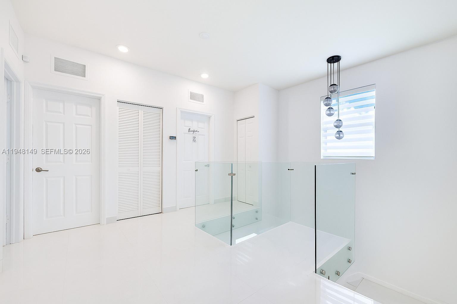 11711 Southwest 254th Street Homestead, FL 33032 - Photo 7 of 17 a bathroom with a shower and a sink