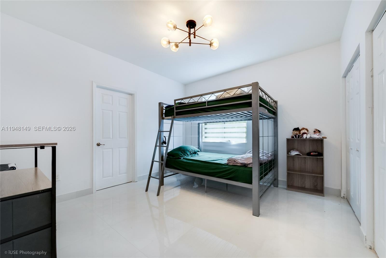 11711 Southwest 254th Street Homestead, FL 33032 - Photo 10 of 17 a bedroom with bunk bed