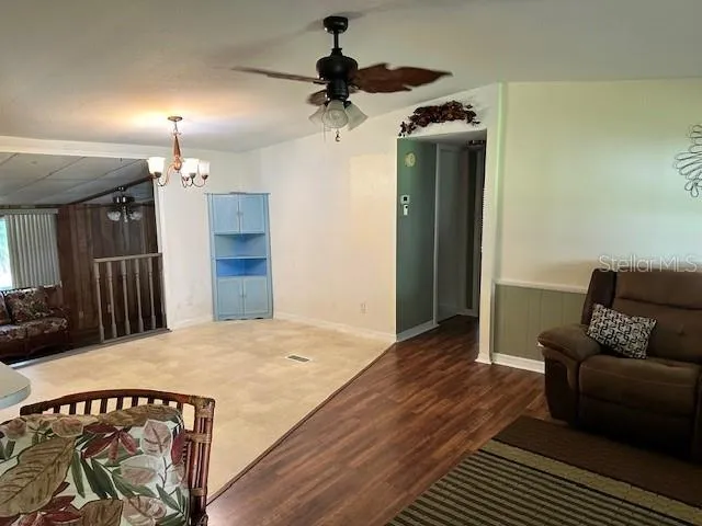 a living room with a bed and a couch