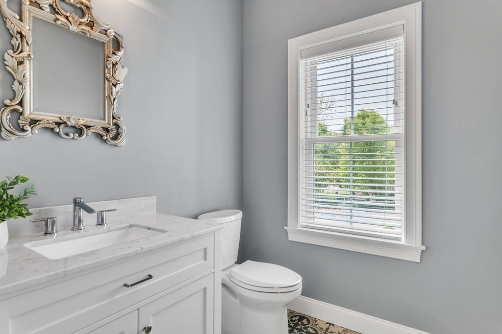 273 Scantic Road Hampden, MA 01036 - Photo 17 of 40 a bathroom with a granite countertop sink toilet and mirror