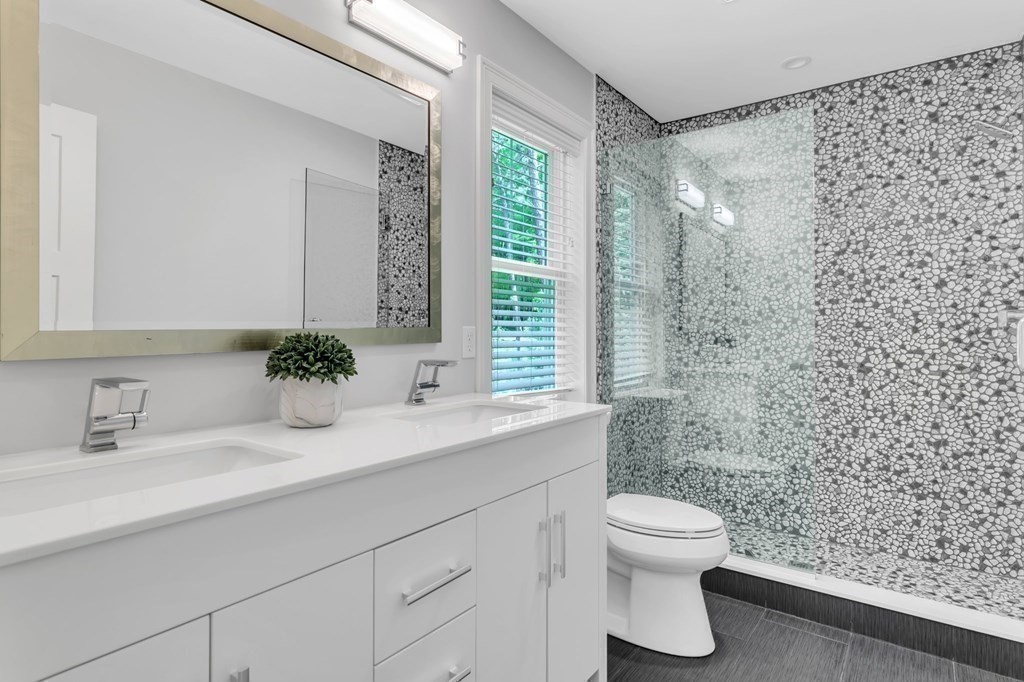 273 Scantic Road Hampden, MA 01036 - Photo 27 of 40 a bathroom with a sink toilet and shower