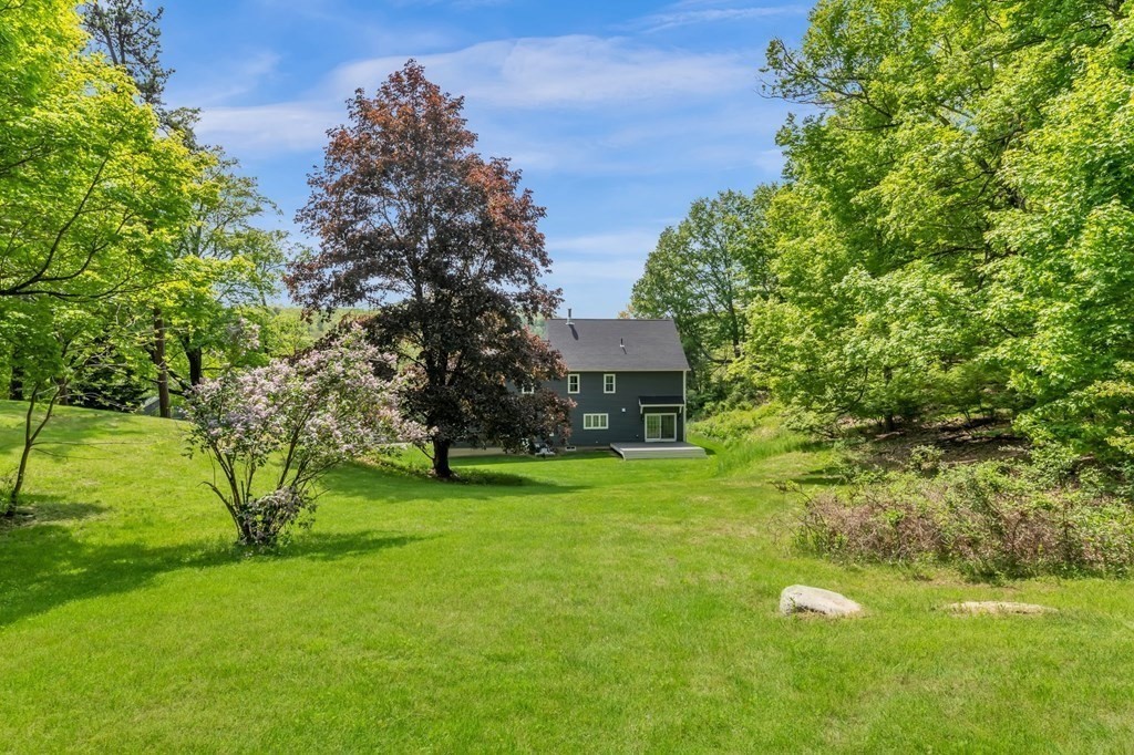 273 Scantic Road Hampden, MA 01036 - Photo 37 of 40 a view of a house with a garden