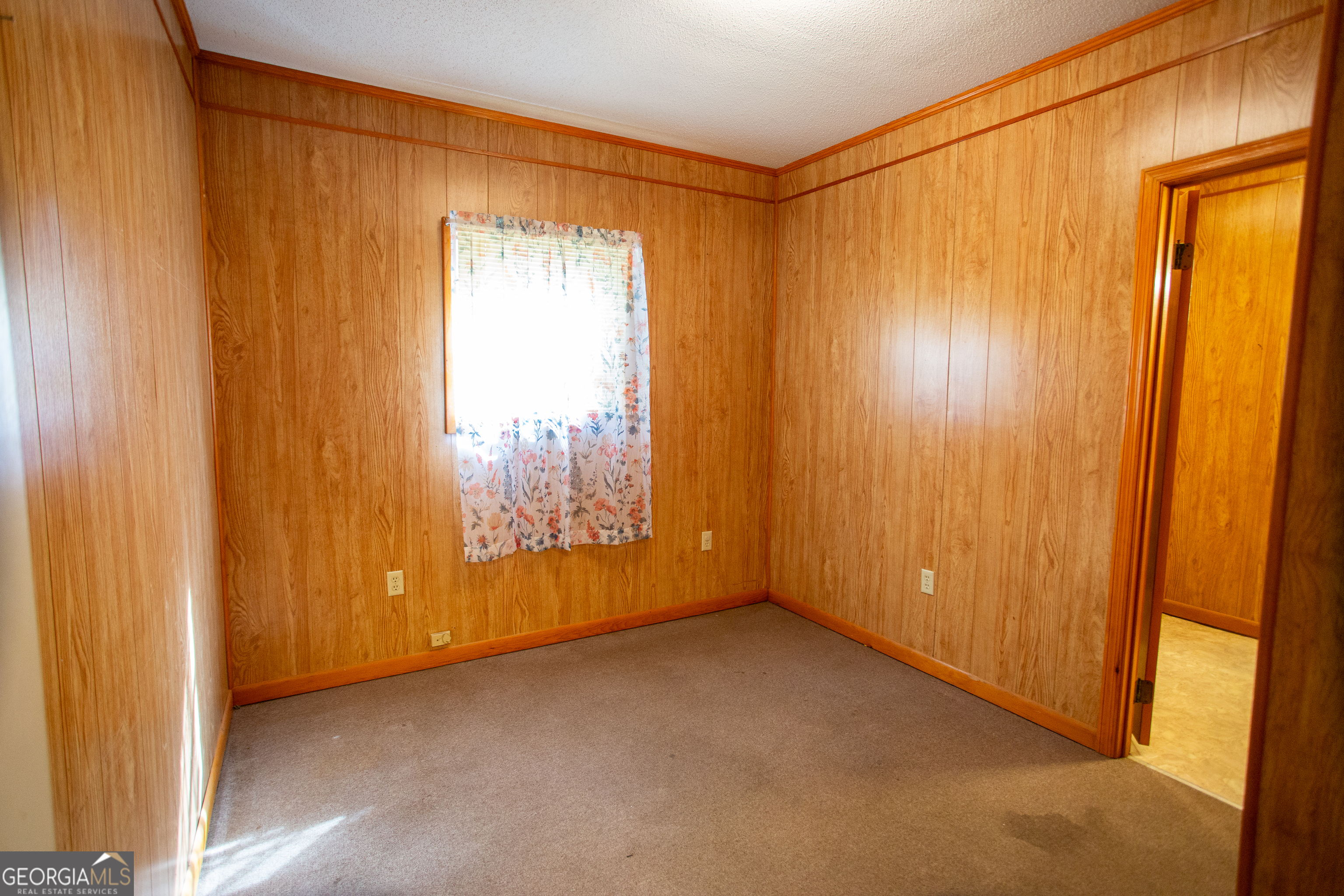 537 City Circle Road Baxley, GA 31513 - Photo 33 of 33 a view of an empty room with a window
