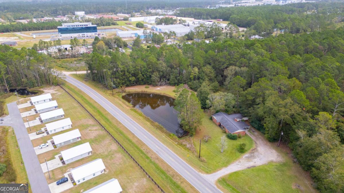 537 City Circle Road Baxley, GA 31513 - Photo 10 of 33 an aerial view of residential houses with outdoor space