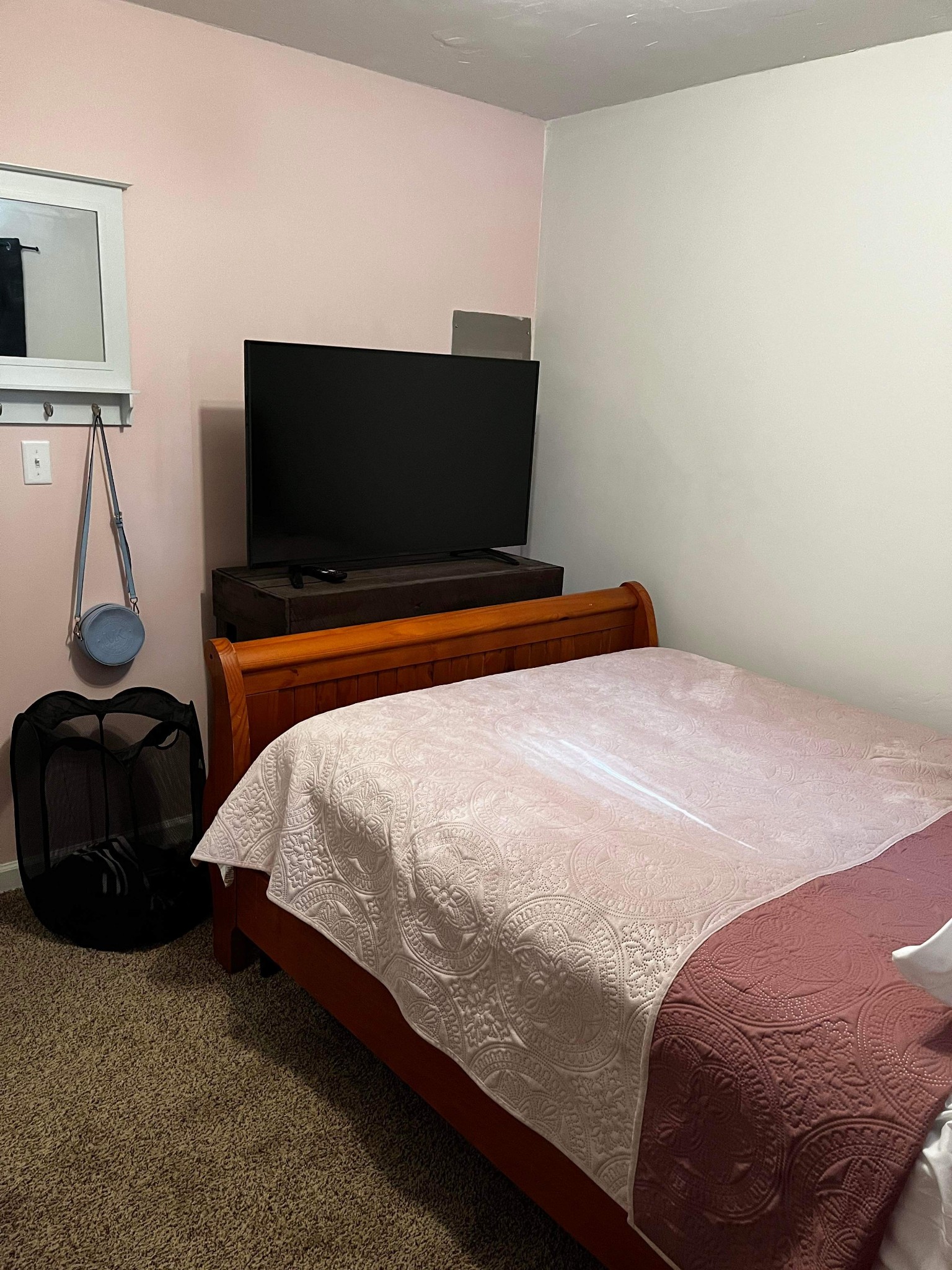 207 Quail Ridge Road Clarksville, TN 37042 - Photo 8 of 12 a bedroom with a bed and a flat screen tv