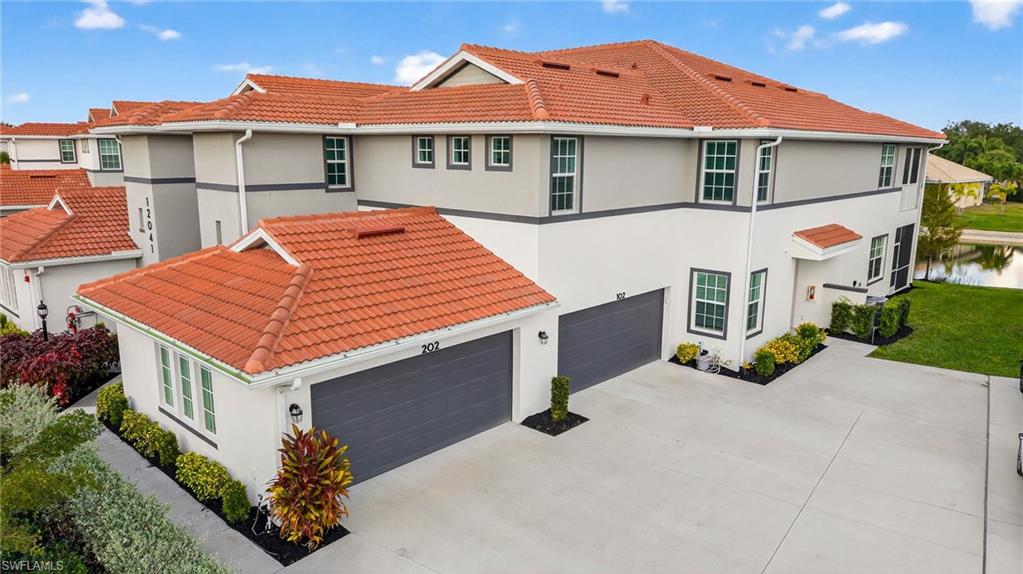 12041 Santaluz Drive, Unit 202 Fort Myers, FL 33913 - Photo 2 of 42 View of front of house