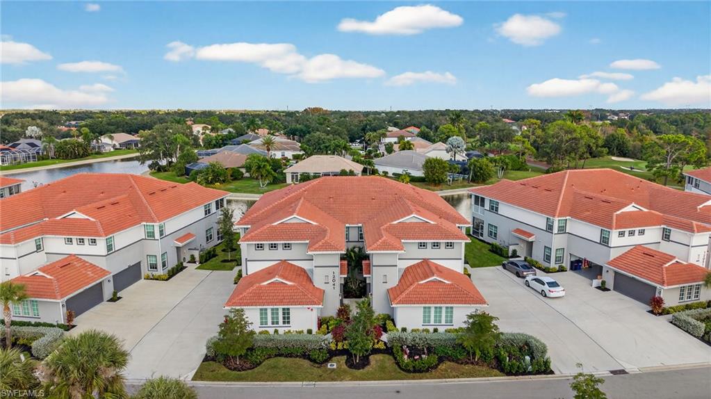 12041 Santaluz Drive, Unit 202 Fort Myers, FL 33913 - Photo 36 of 42 Aerial view of residential area