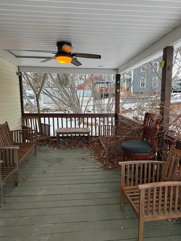 a view of balcony with furniture