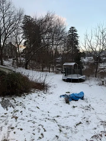 a view of a backyard with a snow