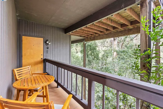 a view of dinning table and chairs on the roof deck