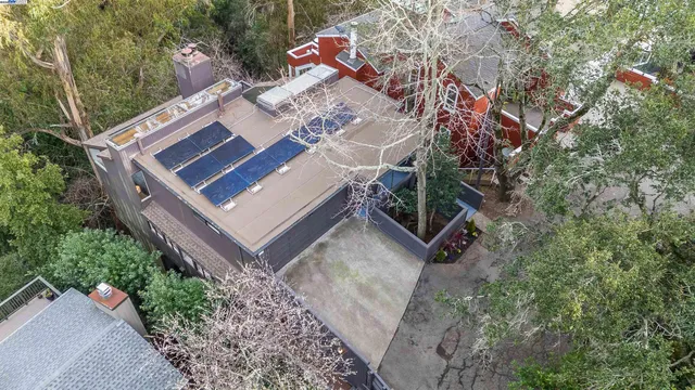 a street sign on a pole on a city street