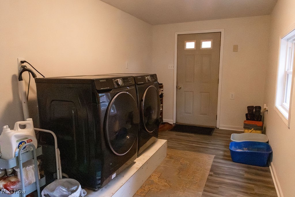 1995 Benjamin Road Madison, OH 44057 - Photo 21 of 50 Laundry area featuring washing machine and dryer and wood finished floors