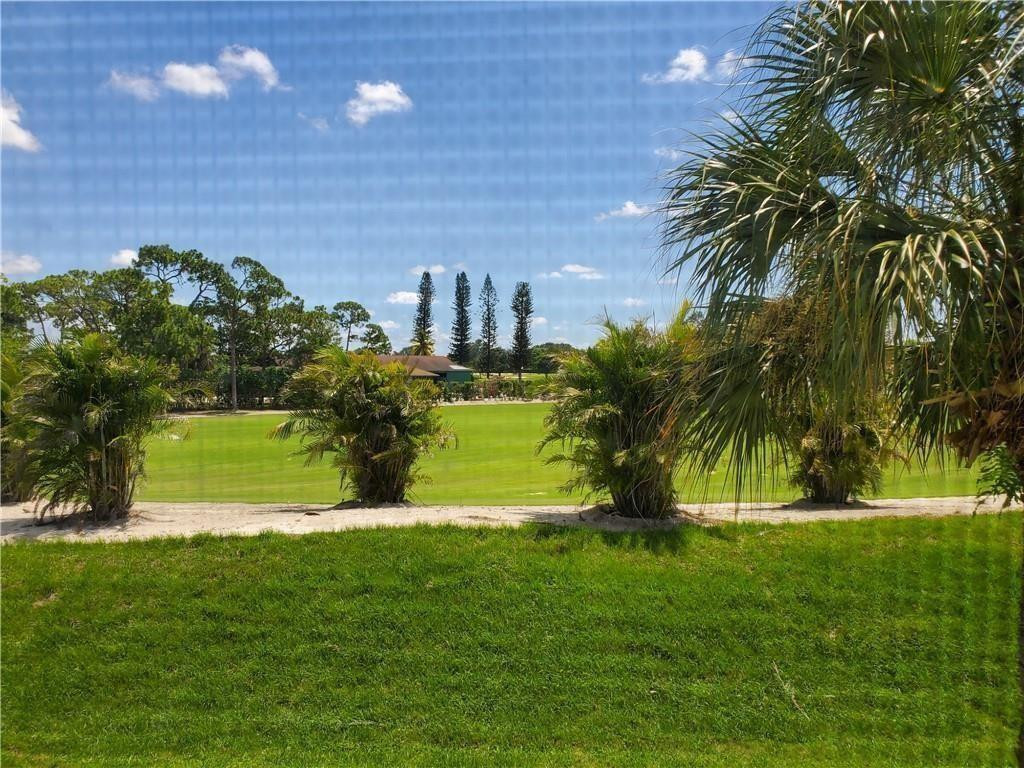 6061 Balboa Circle, Unit 201 Boca Raton, FL 33433 - Photo 5 of 7 a view of a garden