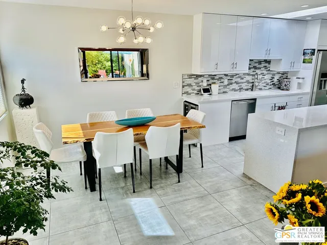 a kitchen with a stove and a sink