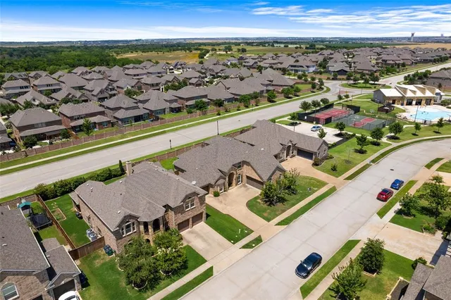 a picture of a bench in front of a building