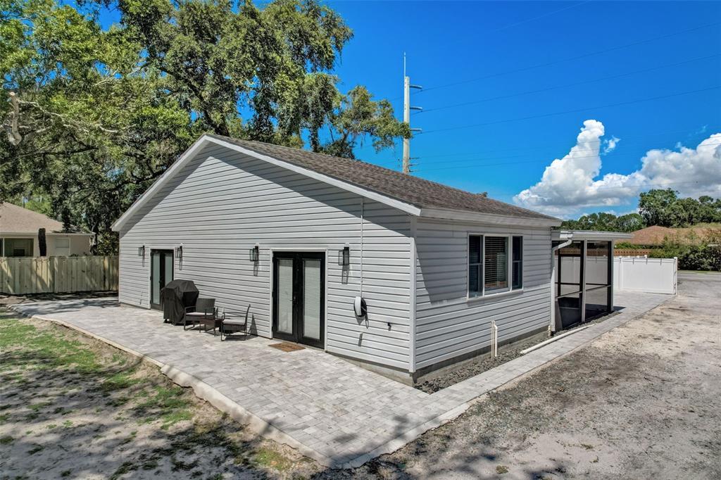 3030 Ashton Road Sarasota, FL 34231 - Photo 30 of 41 a view of a house with a yard