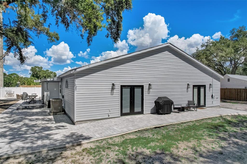 3030 Ashton Road Sarasota, FL 34231 - Photo 31 of 41 a view of a house with backyard