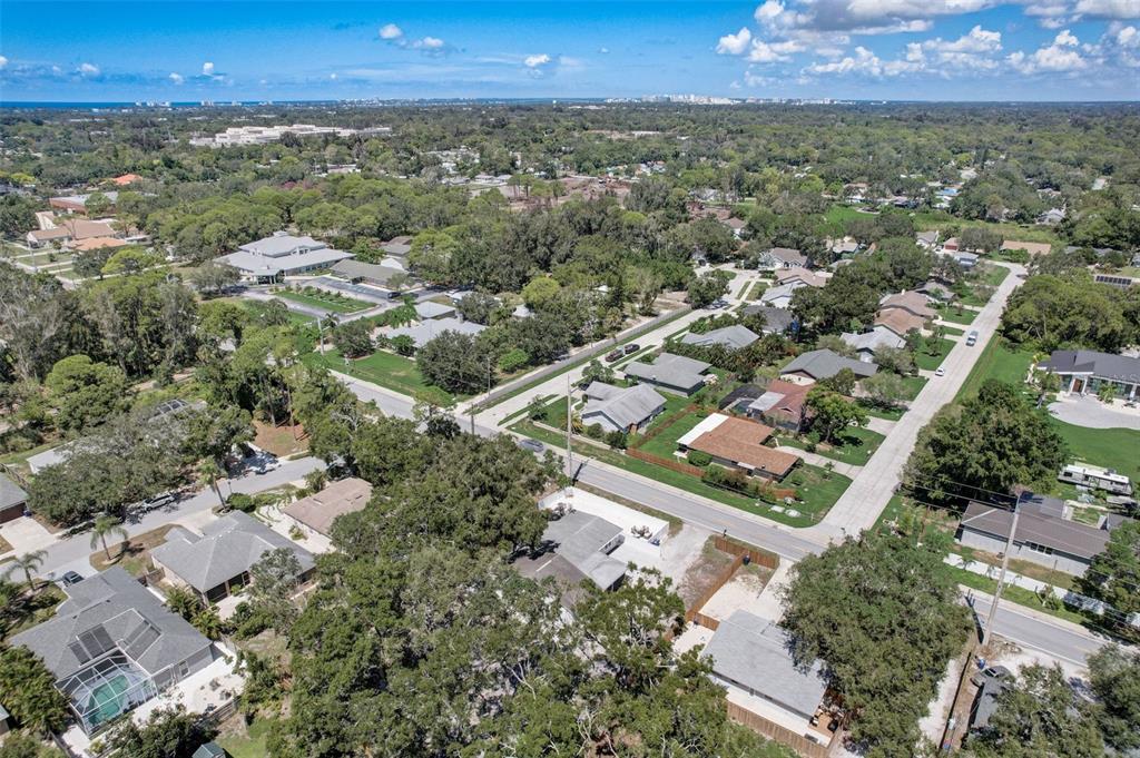 3030 Ashton Road Sarasota, FL 34231 - Photo 35 of 41 an aerial view of residential houses with outdoor space and trees