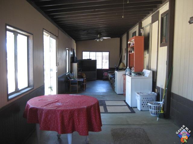 6073 Goss Road Phelan, CA 92371 - Photo 17 of 17 a bed room with a bed and a television