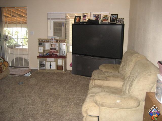 6073 Goss Road Phelan, CA 92371 - Photo 4 of 17 a living room with furniture and a table