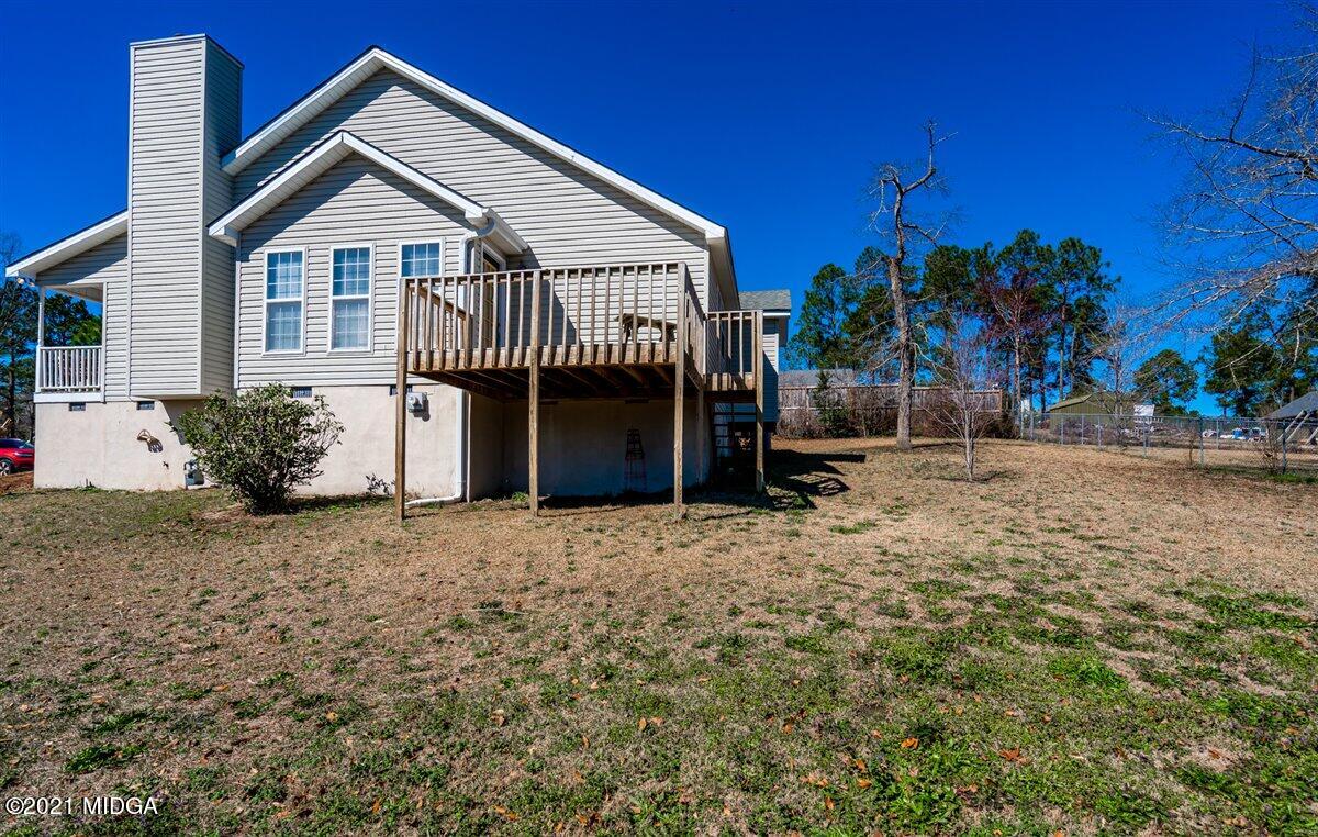 306 Jason Court Macon, GA 31216 - Photo 4 of 22 a front view of a house with a yard