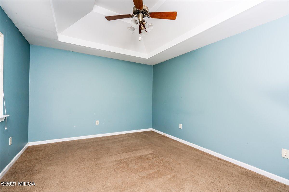 306 Jason Court Macon, GA 31216 - Photo 9 of 22 a view of a room with a fan