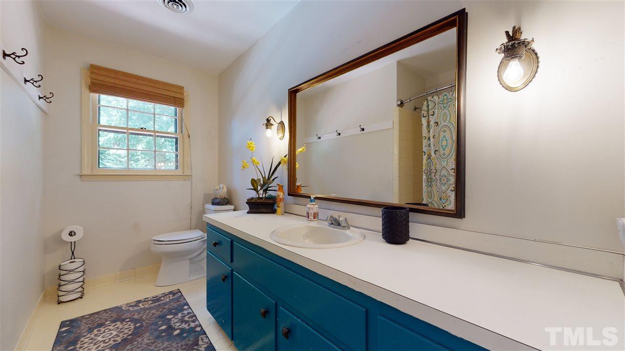 8613 Wood Lawn Drive Raleigh, NC 27613 - Photo 25 of 30 hall bath