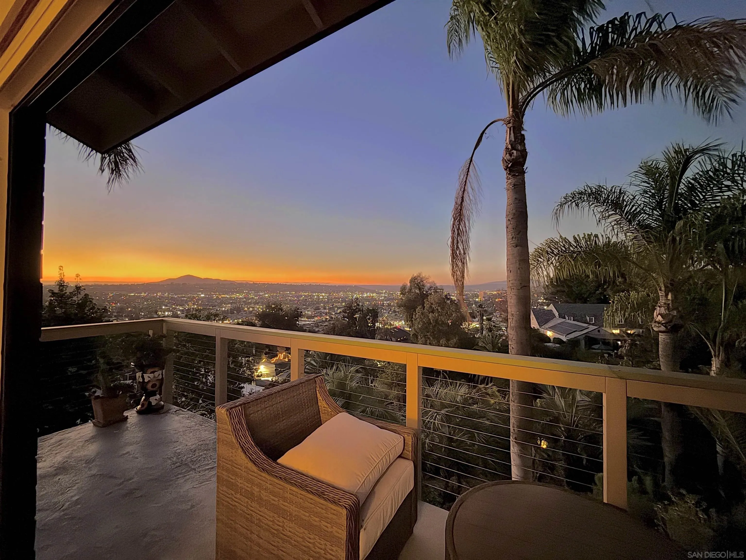 5346 Grandridge Road El Cajon, CA 92020 - Photo 13 of 50 a view of a balcony with mountain view and wooden floor